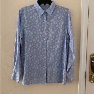 Be a star in this beautiful button down blouse!